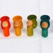 Montessori inspired matching game with peg dolls and cups