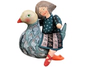 girl riding a bird. painted folk art doll - soft sculpture