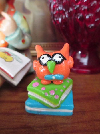 Genius the nerdy owl figurine.