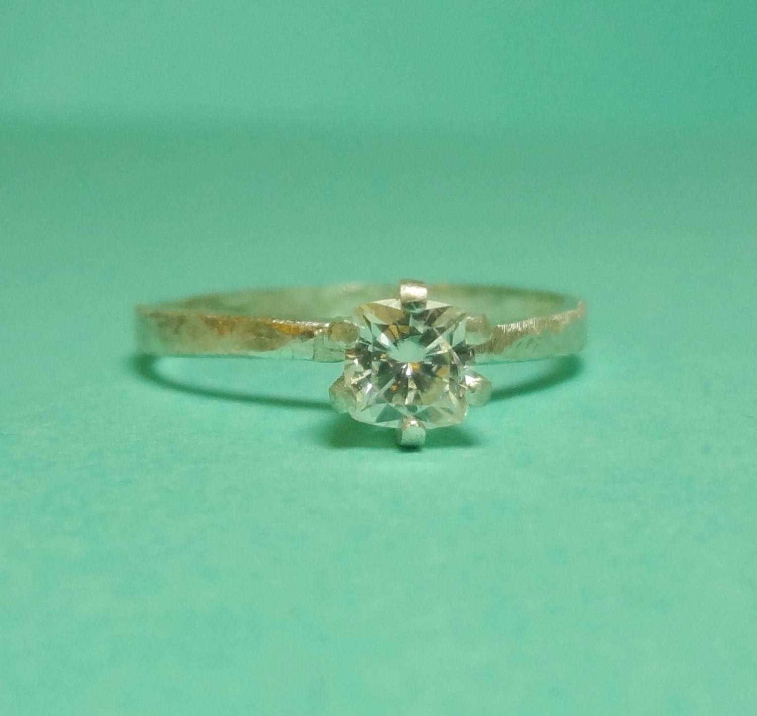 The Deep V - 4.5mm Cushion Cut Moissanite Sterling Silver 6-Prong Deep V Ring