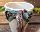 Ladybugs and Gumnuts Stoneware Cup/Mug - Wheel formed & featuring sculpted tree brand handle.
