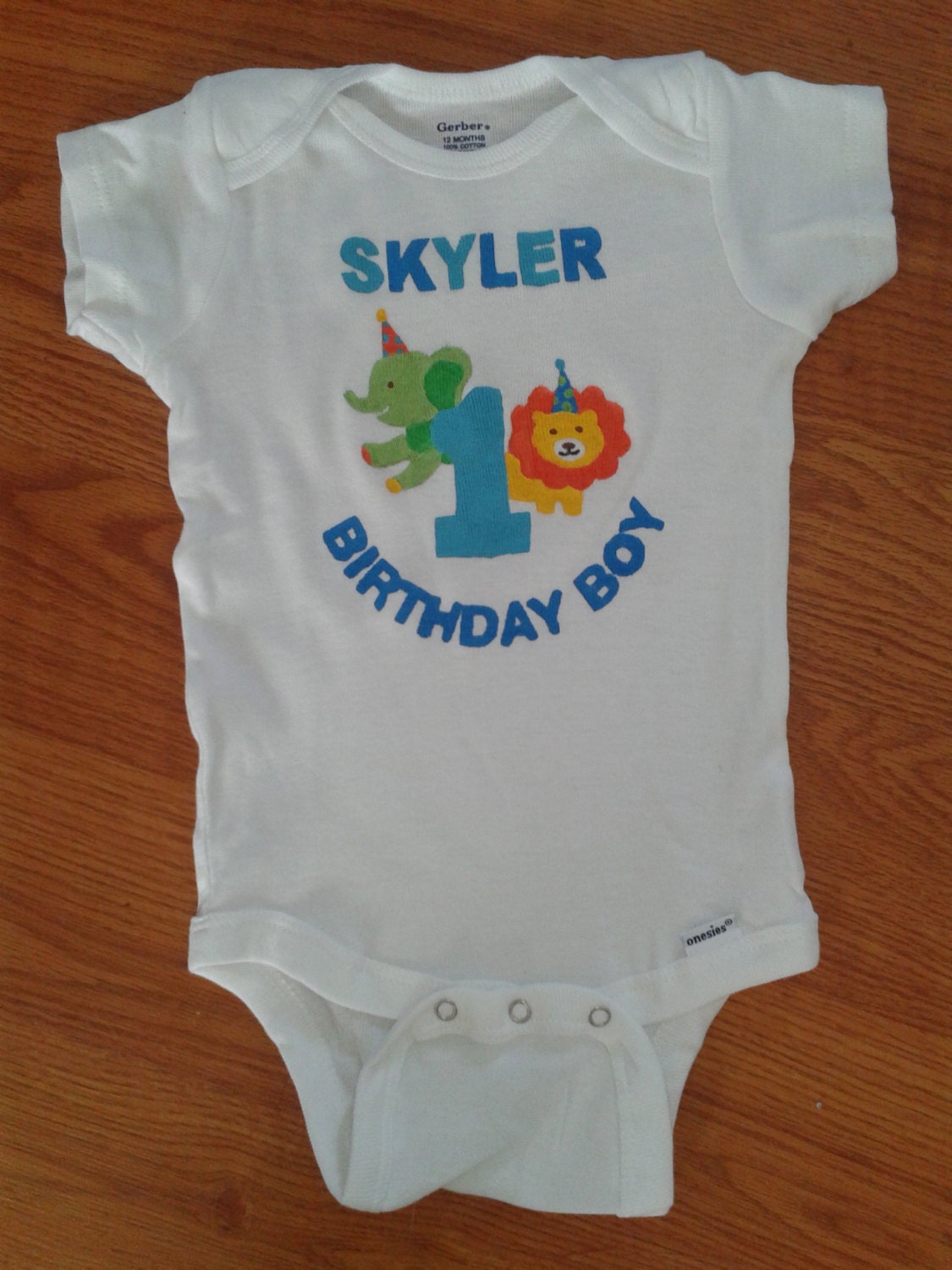 Adorable Birthday Boy Onesie in a Zoo Animals Theme and Matches Sweet Safari Party Supplies