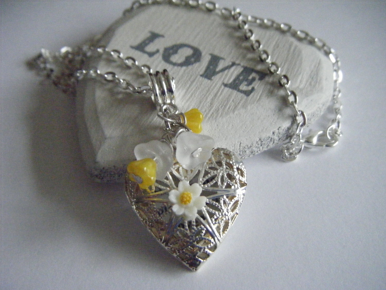 Hunger Games Rues Lullaby Daisies Guard You Daisy Locket Necklace Rue Katniss Here is the place where I Love You