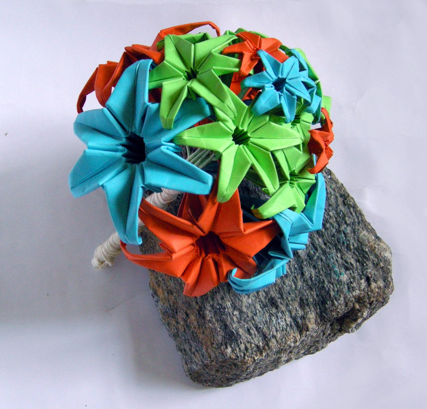 Toss bouquet from origami paper flowers in desired colors