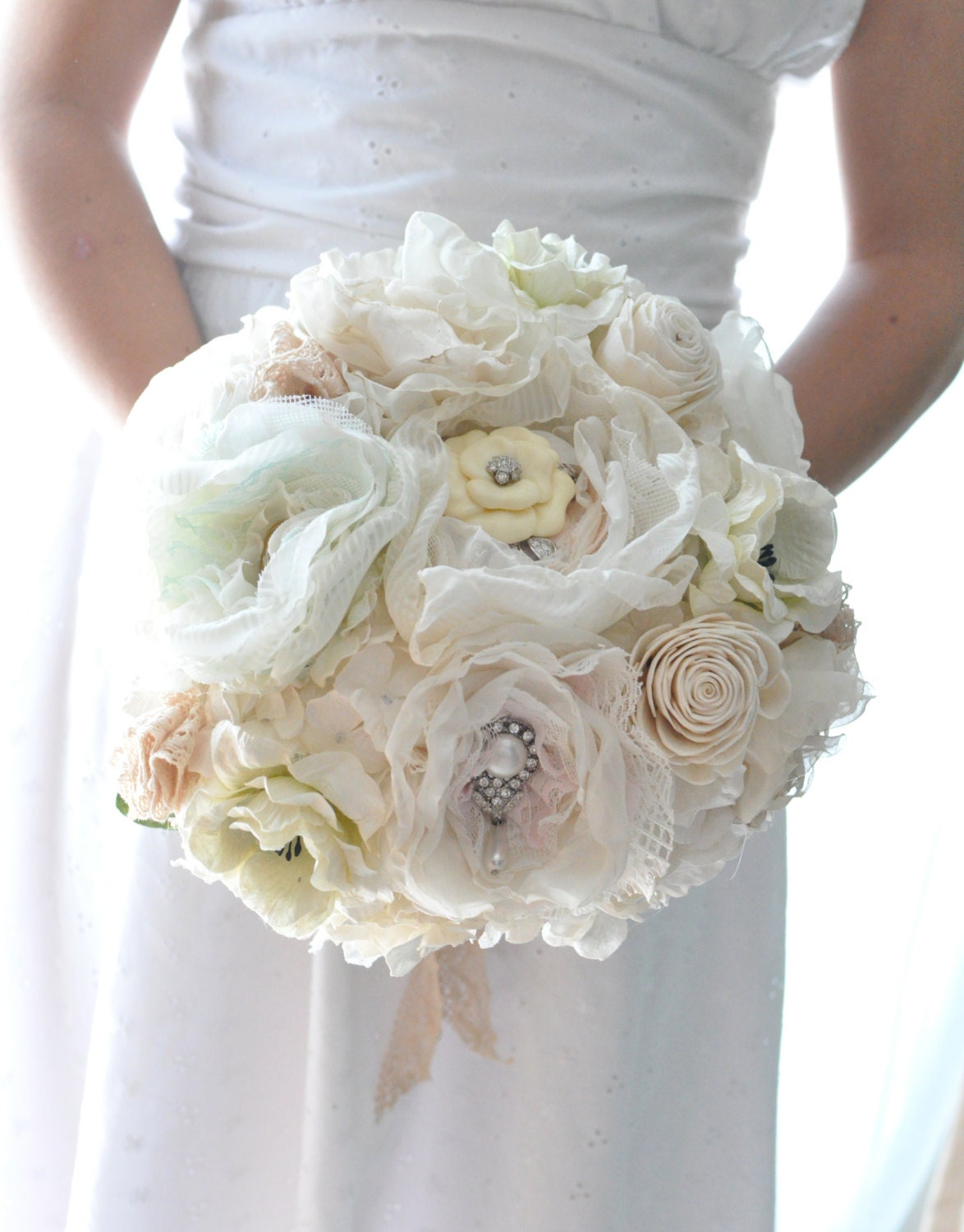Vintage wedding bouquet, oldworld charm of lace and pearls among paper flowers and seafaom, blush pink and pastel peach fabric flowers