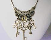 Vintage inspired skeleton keys locket necklace retro jewelry brass bronze metal 24 inch victorian style old keys
