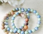 Three Beaded Bracelets in Blues and Earth Tones