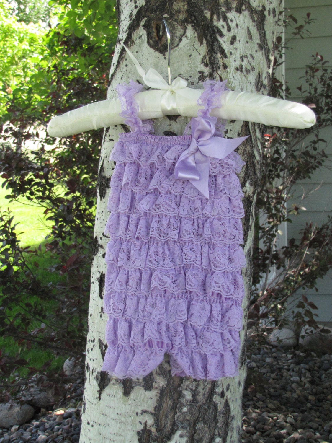 Purple Lace Romper with Bow.