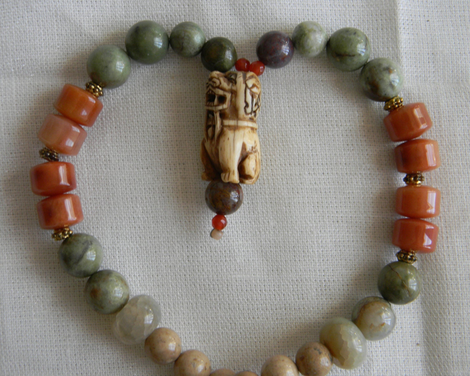 Good fortune amulet , guardian lion in carved bone & opal beads w/ beaded jewelry , Shishi , protection talisman , Asian ethnic necklace