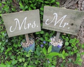Mr. & Mrs. Rustic wedding signs on a stake in vintage style buckets