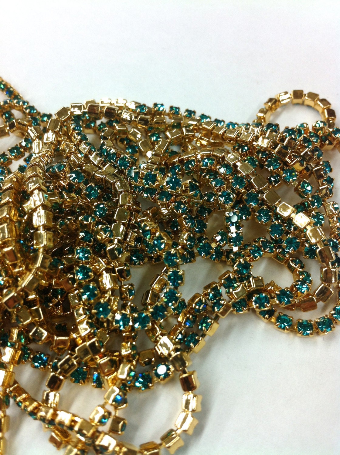 Gold Metal Trim with Emerald Green Rhinestones by the foot