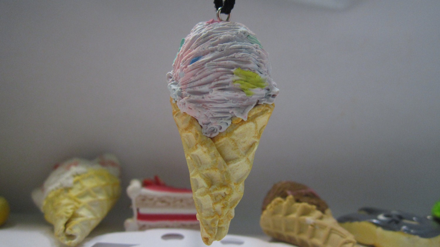 Polymer clay ice cream, rocky road/vanilla chocolate chip,cotton candy, chocolate with strawberry drizzle