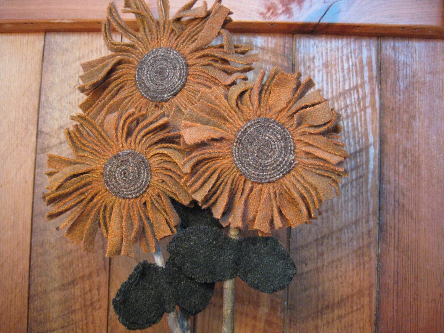 recycled wool scrap rug hooked burnt orange primitive sunflowers on hickory sticks