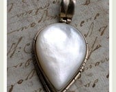 Vintage  sterling silver Mother Of Pearl teardrop large pendant stamped sterling hinged bail engraved silver white pearl