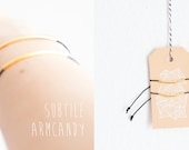 Subtile armcandy - black and gold