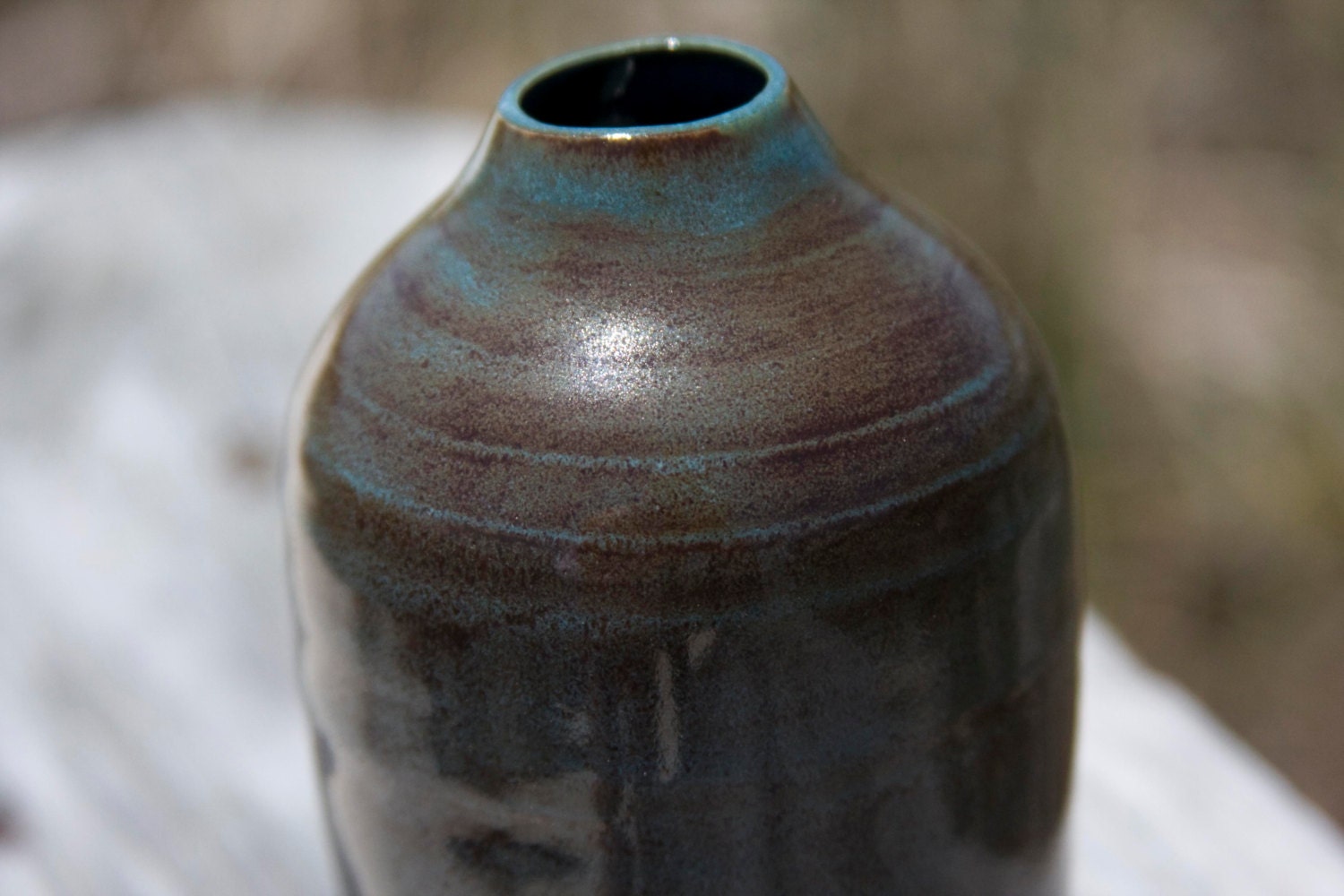 Small blue and brown high-fire ceramic vase