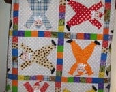 Bright Cartwheel Clown Baby Quilt