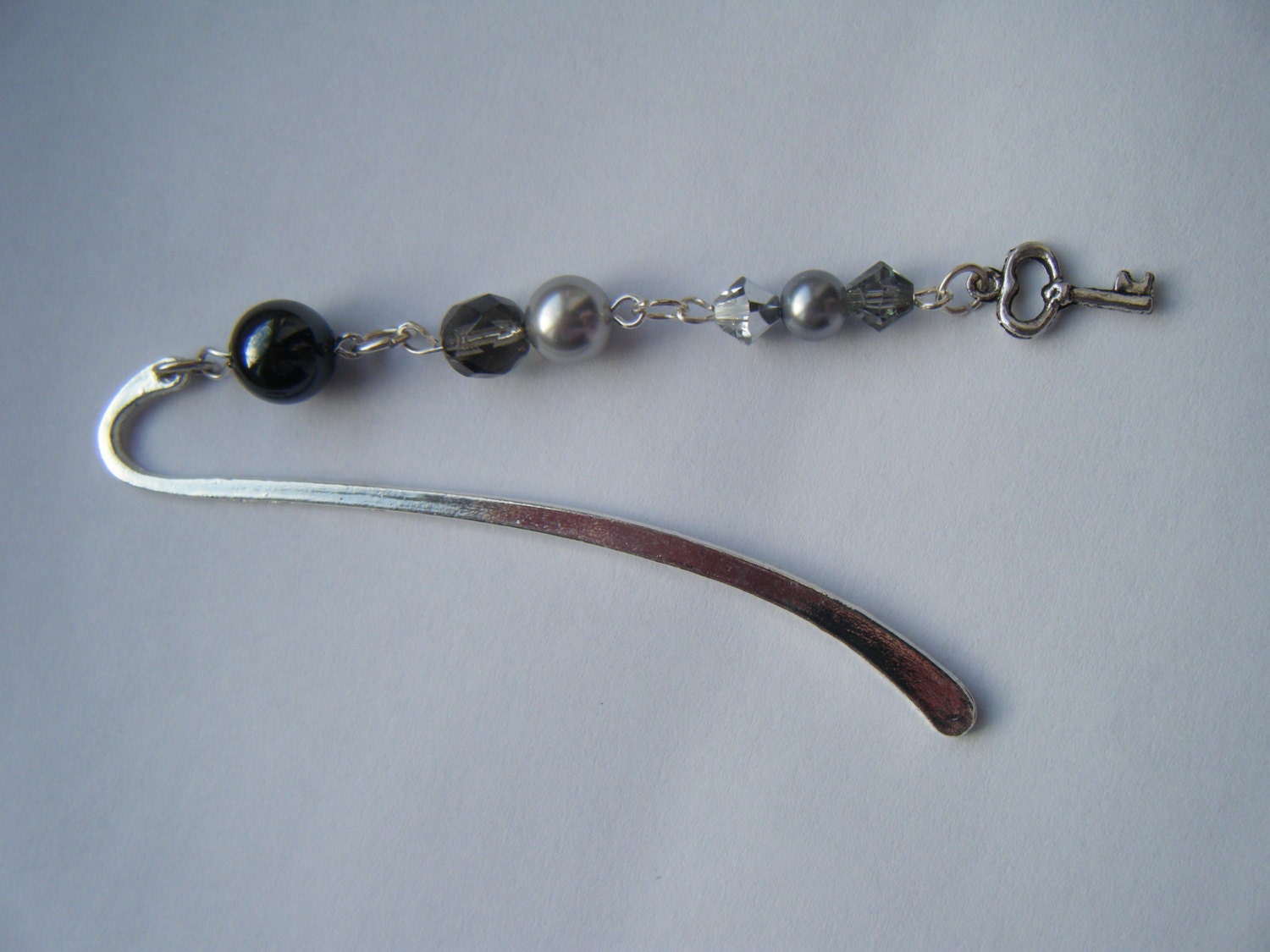 Beaded metal bookmark in not quite fifty shades of grey