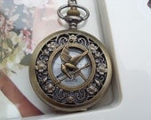 Antique pocket watch sweater chain necklace  The hollow small daisy pattern Hunger Games parrot sword   Bronze vintage jewelry