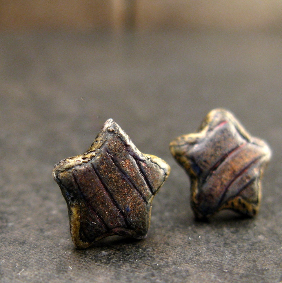 Small metallic striped stars post earrings in polymer