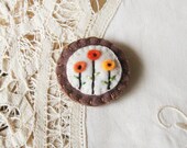 Woodland flowers embroidered felt pin brooch in brown and orange