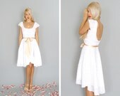 Imogen: White lace short reception dress with circle skirt & cap sleeves