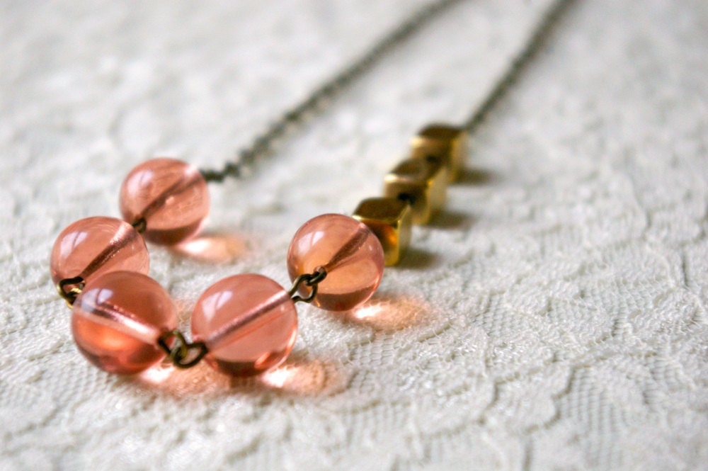 Sophia necklace. Peach glass beads and raw brass beads on antique bronze chain.