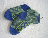 Handknitted socks with norwegian pattern in wool