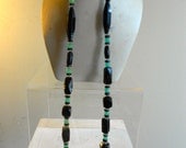 1920's, 31" long green and black art deco necklace