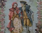 Colonial Couple with Colorful Flowers - Embossed Die Cut Valentine - early 1900's
