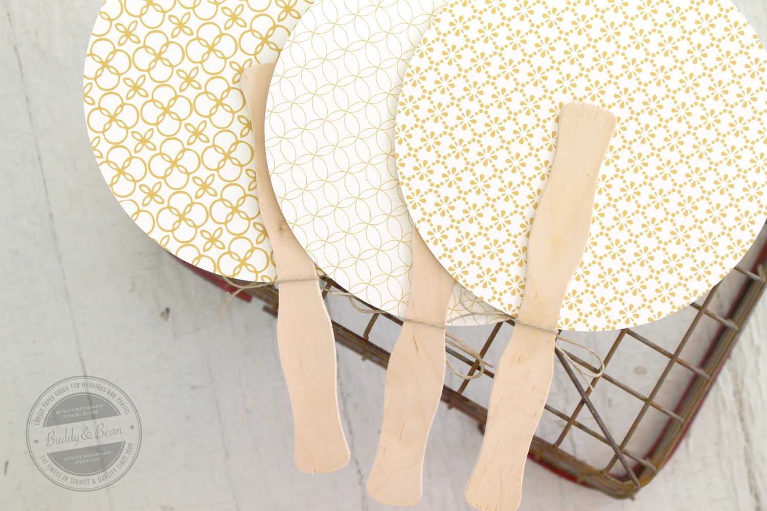 Round program fan. 3 patterns. yellow gold no.18 on cream