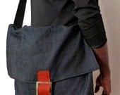 Messenger denim bag with leather fastener/ Holds laptops /raw jeans denim handmade by Wendel Johnston/ lined with wool/ seat belt straps