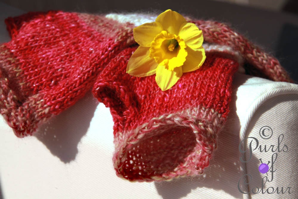 Deliciously soft and warm handknitted armwarmers: Raspberry Ripple