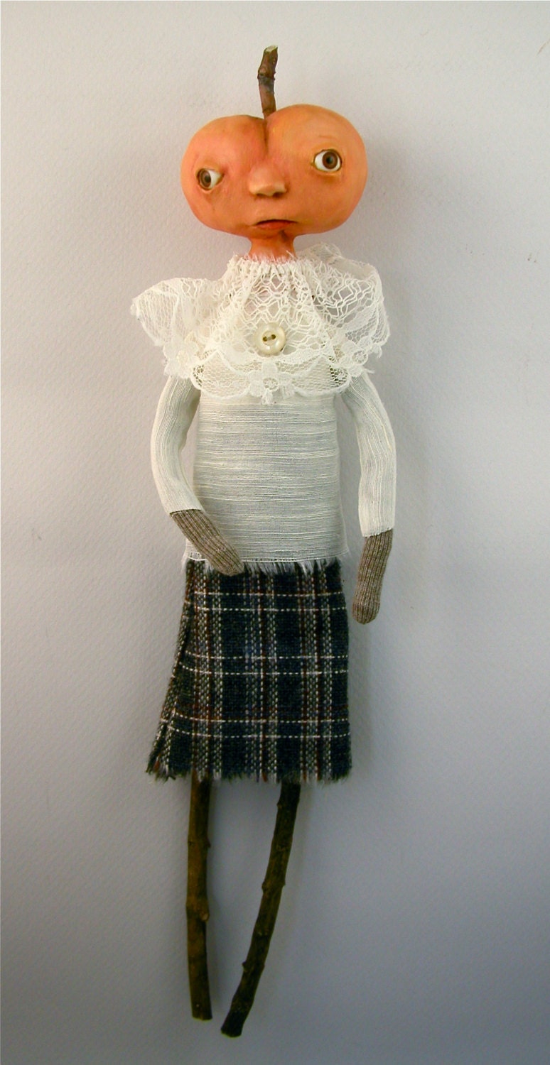 Contemporary folk art pumpkin head doll clay and cloth