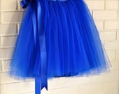 Ready to ship. True blue tulle skirt tutu for women lined in black satin with a royal blue satin ribbon waist. Retro fashion trend.