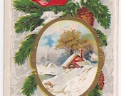 Antique Christmas Postcard "A Joyful Christmas" Snow Covered Cottage Scene bordered by Pine Needles and Bright Red Bow
