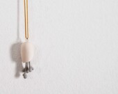 minimalist skiny pod pendant with multiple hearts