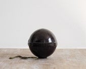 Bakelite string or yarn holder from 1930s England for knitters storage or decoration