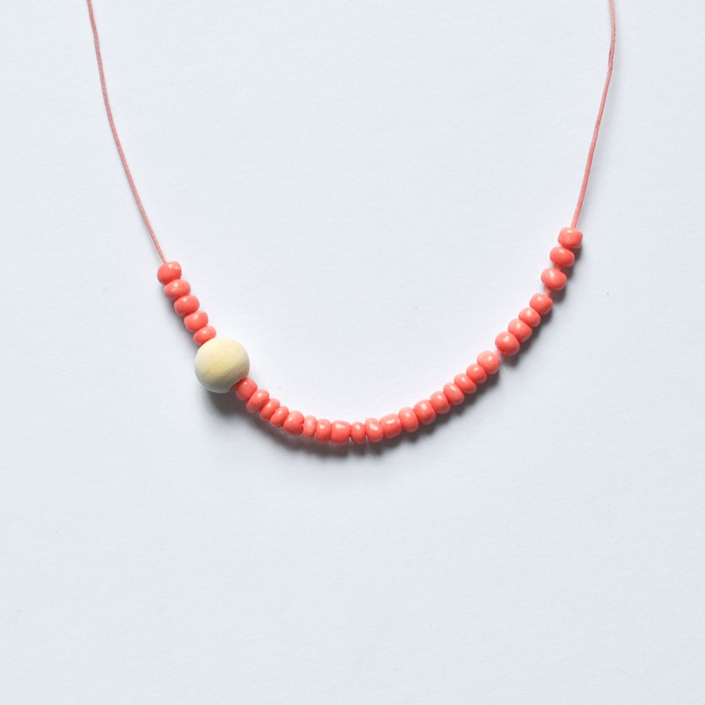 Coral pink & wooden bead necklace