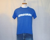 Vintage 80s BLUE LIFEGUARD GRAPHIC Blue Classic Beach Small Medium Hanes Cotton T-Shirt