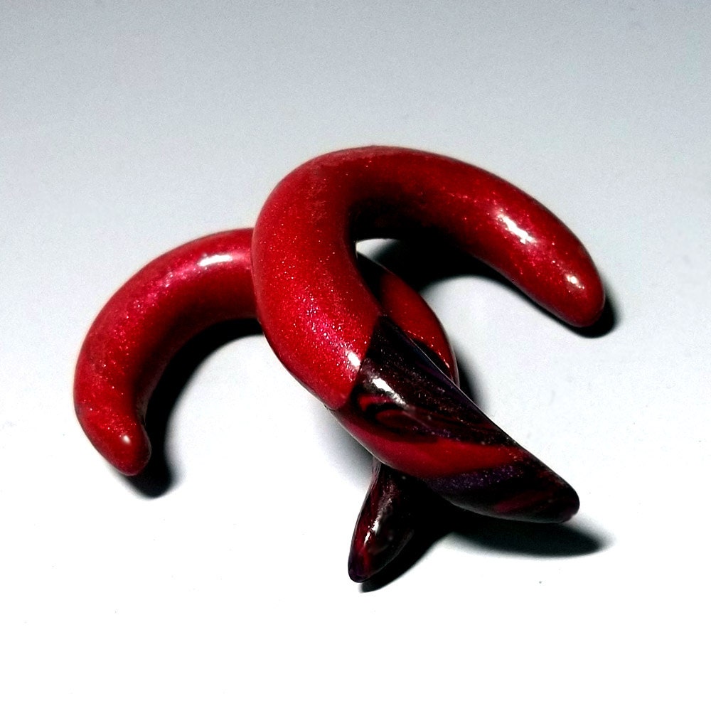 Gauges, 0g polymer clay plugs for stretched ears. SPECIAL, tipped crimson, claw, red, purple, and black.