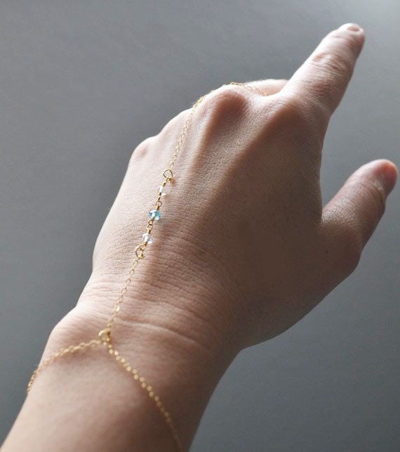 Gold slave bracelet, ring...