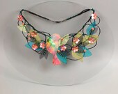Fiber fine art floral necklace with bird and pink flowers. Floral garden jewelry for romantic bride.