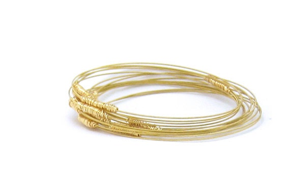 Thin Gold Bangle Bracelets // Set of 9 Bracelets // Gold Guitar Strings, Gold Wire Wrap // "G" // Eco-Friendly Recycled Jewelry // Gift