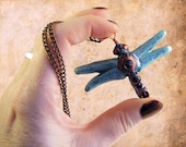 Blue dragonfly pendant with copper clockwork gears detail. Handmade steampunk jewelry