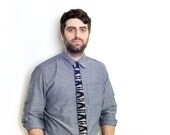 Black and grey woven ikat tie