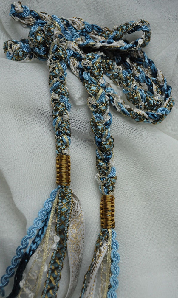 Handfasting cord inspired by ancient Greek/classical styles. In turquoise and antique gold, with light blue and ivory highlights