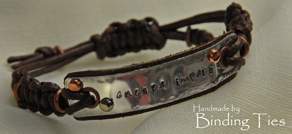 Ancora Imparo leather and aluminium bracelet with knotwork, quote stamp and copper detailing