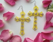 Sparkle cross earrings with spikes
