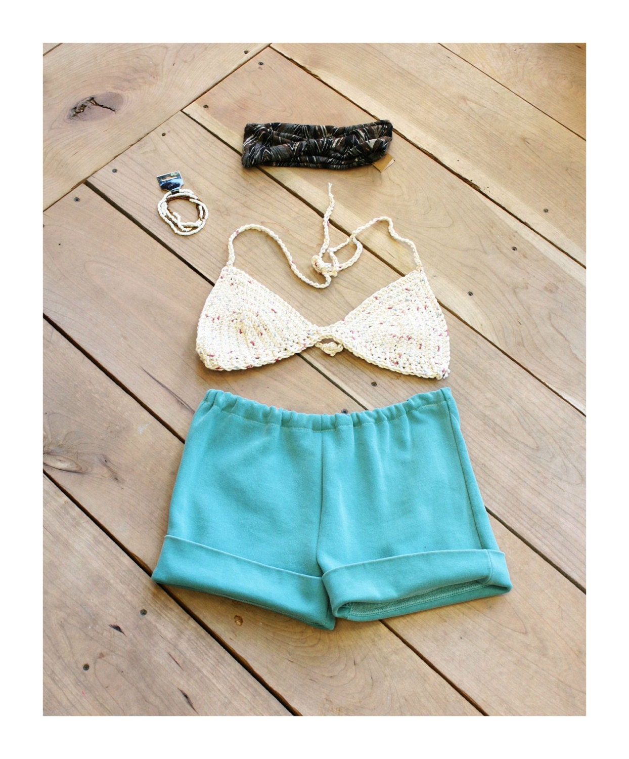 Buy This Outfit. handmade eco shorts with crochet bikini top and beaded necklace of copper and white beads. eco beach spring fashion